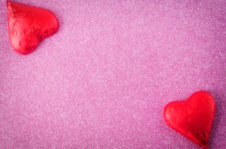 two hearts at pink bright background