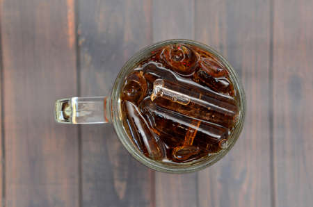Top view cola glass on wood backgroundの写真素材