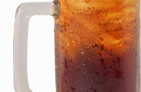 cola glass with ice on white backgroundの写真素材