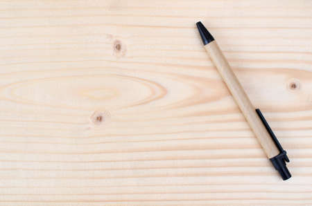 Pen with copy space on wood backgroundの写真素材
