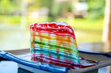 Colorful bright crepe cake rainbow layer.の写真素材