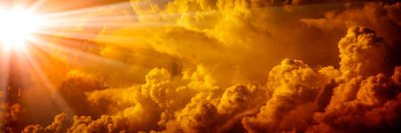 Bright Sunlight Shining Through Orange Clouds