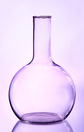 big transparent flask on lilac backgroundの写真素材