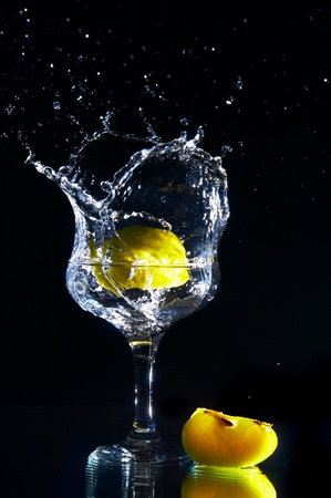 goblet and fruits isolated on black backgroundの写真素材