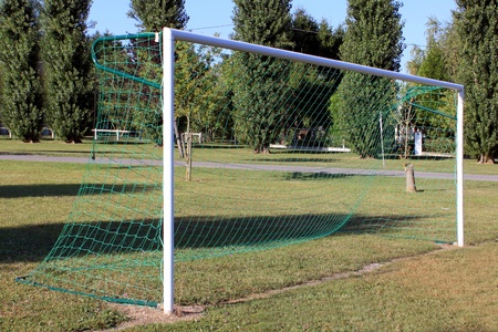 goal with a football field on nature backgroundの写真素材