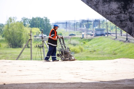 Omsk, Russia - June 2: road worker construction on June 2th 2015