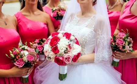 Bride holding the bouguet of beautiful flowersの写真素材