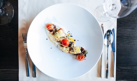 Delicious vegetarian food in restaurant on the tableの写真素材