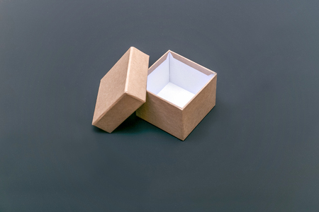 Opened carton handmade box isolated on the grey backgroundの写真素材
