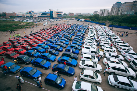 Omsk, Russia - August 22, 2014: Russian Tricolor Car Flashmob. Red, Blue and white automobilesのeditorial素材