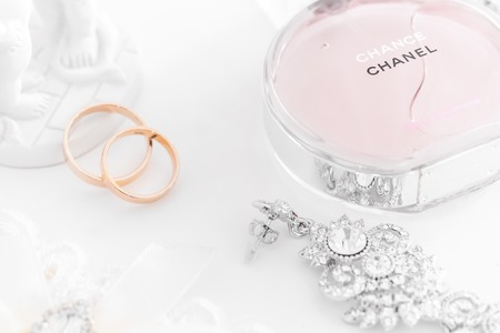Omsk, Russia - June 03, 2014: bride morning  perfume Chanel, garter, earrings and wedding rings, close upのeditorial素材