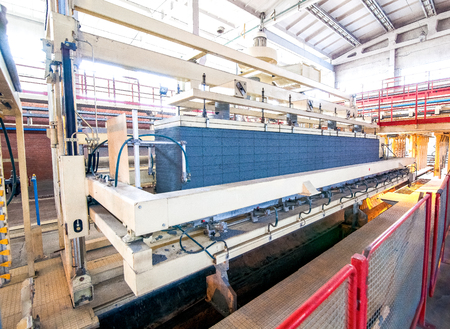 automated industrial equipment at the factory in  bright production hallの写真素材