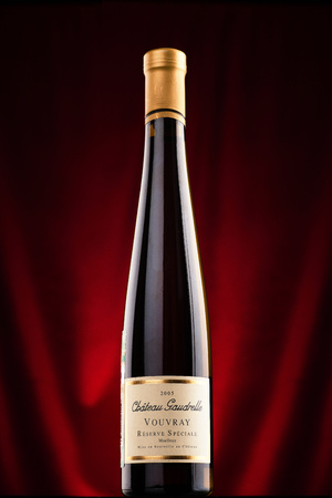 Omsk, Russia - August 14, 2014: Vouvray chateau gaudrelle bottle of red vine on the bar counterのeditorial素材