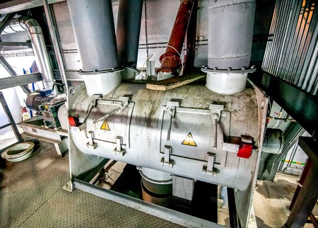 Modern machinery equipment at factory producing concrete blocks