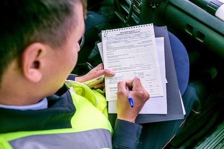Omsk, Russia - July 10, 2015: traffic police raid in Omsk, wraiting protocolのeditorial素材