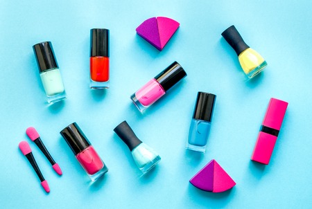 concept cosmetic set on blue background top view.の写真素材