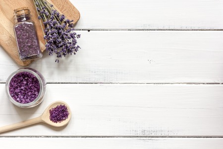 lavender bath salt on wooden table top view.の写真素材