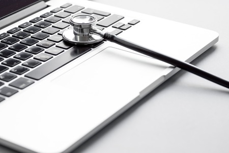 concept - picture of computer diagnostic close up on gray backgroundの写真素材