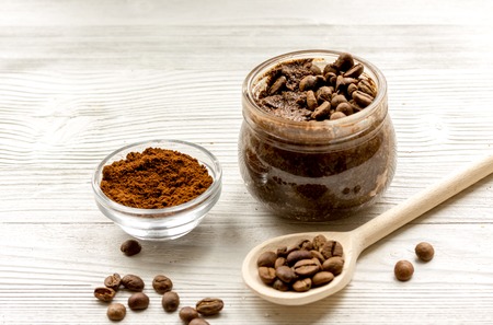 handmade coffee -cocoa scrub in glass jar on wooden backgroundの写真素材