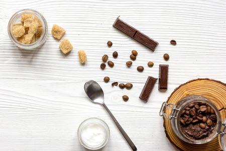 Organic cosmetics based on coffee top view on wooden background.の写真素材