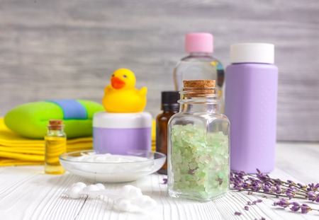 set baby care for bathroom with lavender on wooden background
