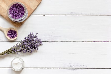 lavender bath salt on wooden table top view.の写真素材