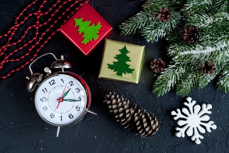 Christmas decorations, spruce branches on dark background top view - 2017 time to celebrateの写真素材