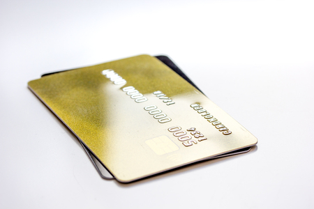 bunch of credit cards on white background close up - online shoppingの写真素材