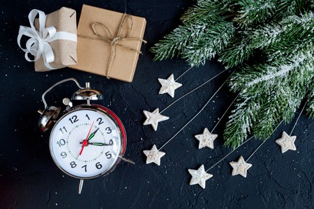 Christmas decorations, spruce branches on dark background top view - 2017 time to celebrateの写真素材