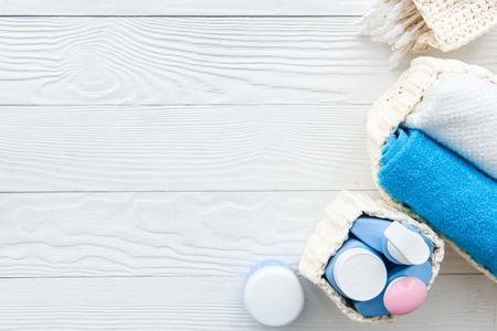 baby organic cosmetic for bath on wooden bakground top view