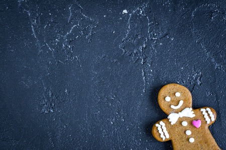 Christmas gingerbread on dark background top view.の写真素材