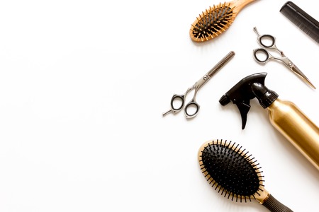 combs and hairdresser tools on white background top view.の写真素材