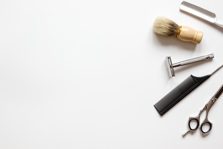 Instruments male hairdresser barbershop top view on white background