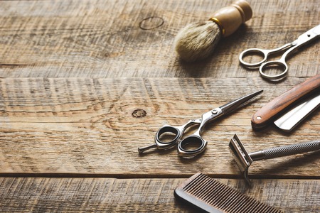 Tools for cutting beard barbershop on wooden background.の写真素材
