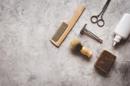 Mens hairdressing desktop with tools for shaving top view.の写真素材