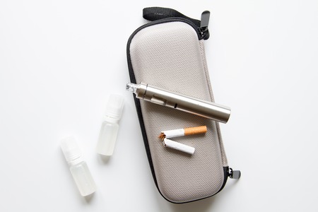 concept of electronic cigarette on white background top view.の写真素材