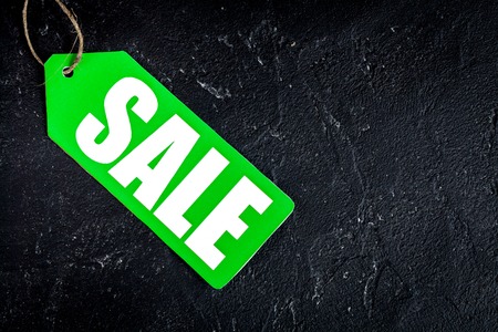concept of sale on dark background top view.の写真素材