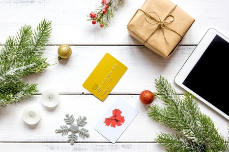 Online shopping for new year on wooden table top view.の写真素材
