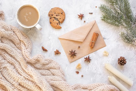 Christmas evening with cup of cocoa on white background top view