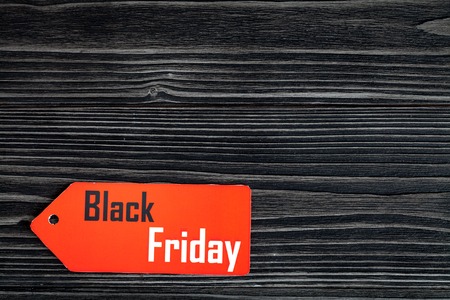 concept black friday on dark wooden background top view.の写真素材