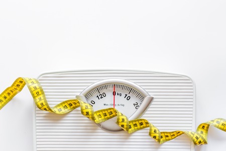 floor scale and centimeter to measure on white background top view.