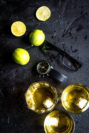 glass of scotch on dark background top view.の写真素材