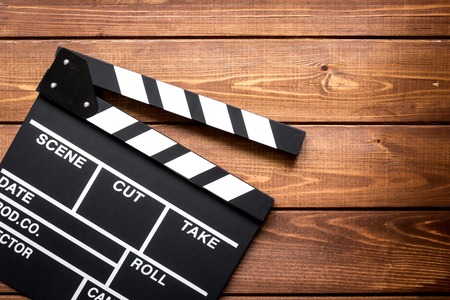 Work screenwriter on wooden background top view.の写真素材