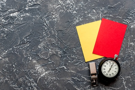 red and yellow cards on dark background top view mock upの写真素材