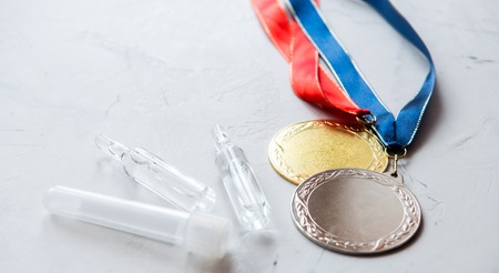 Concept of doping in sport - deprivation medals close upの写真素材