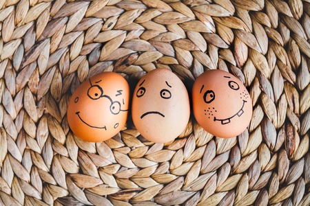 concept human relationships and emotions eggs - support on mat top view
