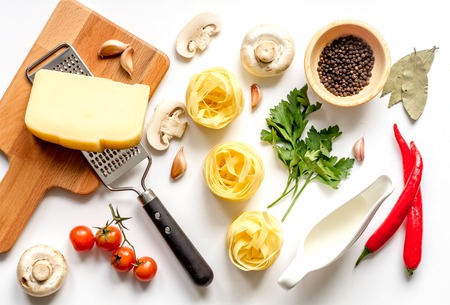 ingredients for cooking paste on white background top view.の写真素材