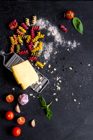 ingredients for cooking paste on dark background top view.の写真素材