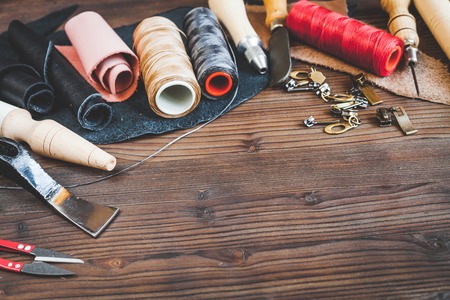 cobbler tools in workshop on wooden background mock up.