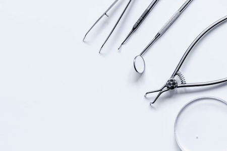 dental tools on white background top view.の写真素材